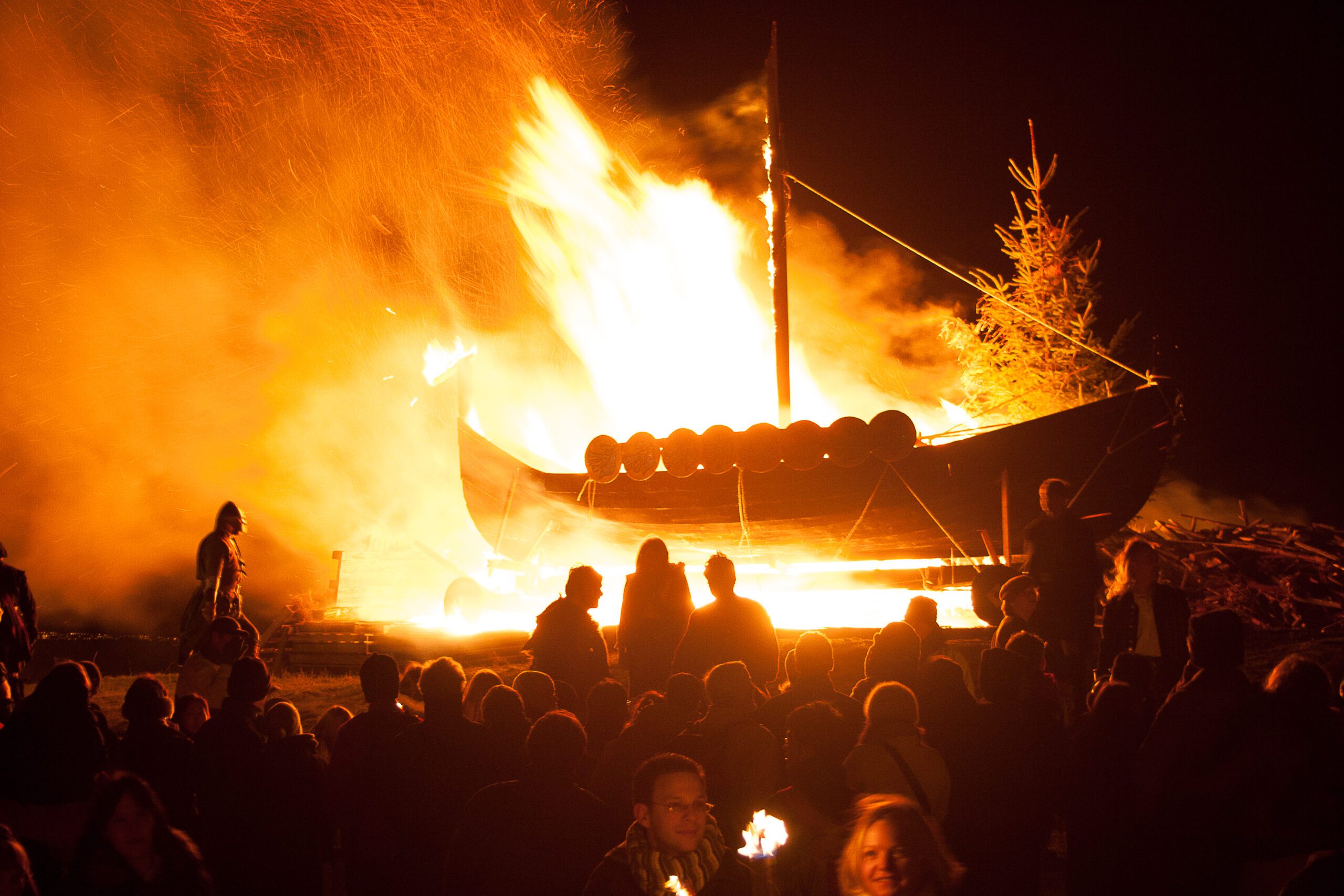 The burning of a viking long boat during up Helly AA celebrations in Edinburgh, Scotland by Nathan David Kelly Photographer